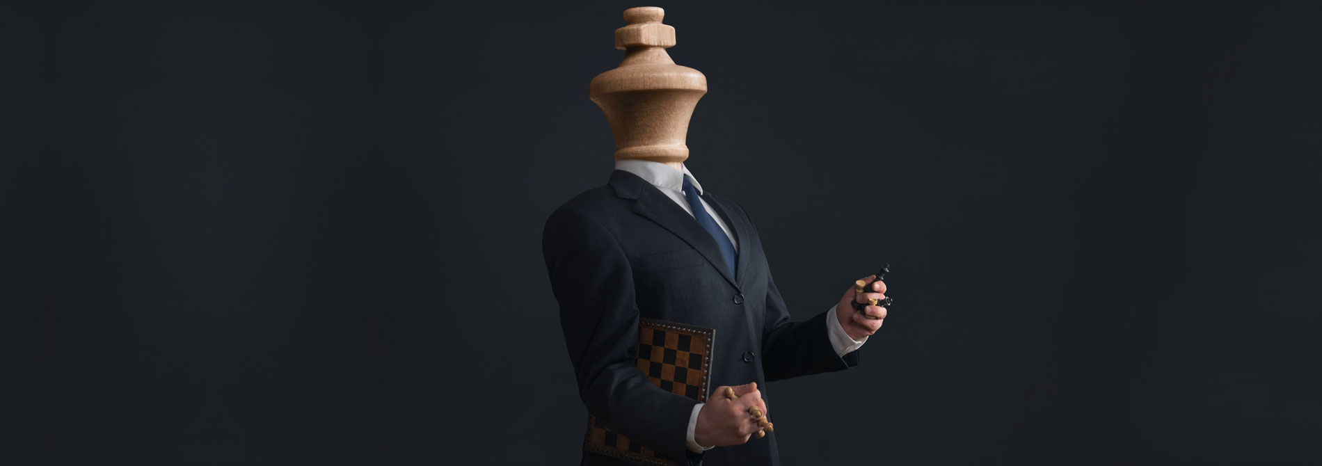 Chess piece dressed up as business man